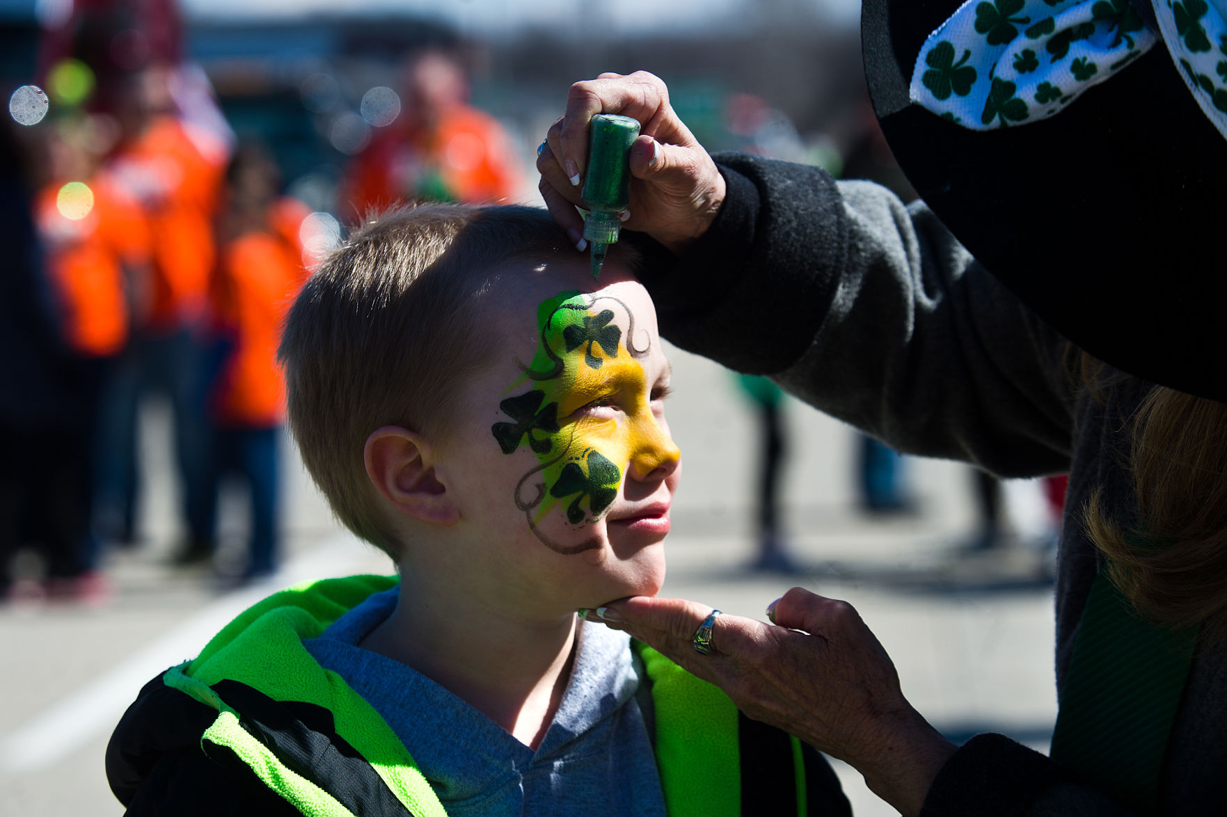 Ayden Holt getting his face painted by Mickey Lower